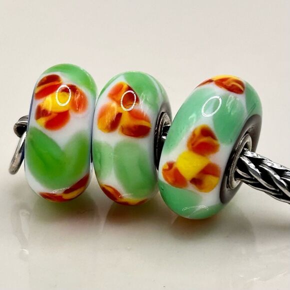TROLLBEADS Red & Yellow Flower Unique #2 LAA 925S on Green & White - Picture 1 of 6